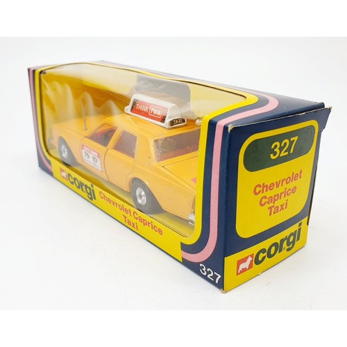 161 - A vintage boxed Corgi Chevrolet Caprice Taxi, 327. UK shipping £14. We combine shipping.