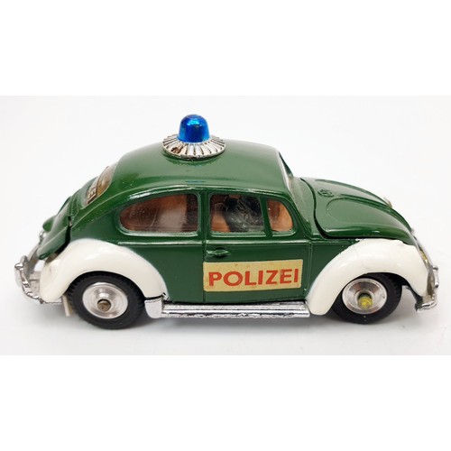 155 - A vintage boxed Corgi Volkswagen European Police Car, 492. UK shipping £14. We combine shipping.