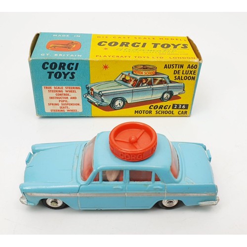 195 - A vintage boxed Corgi Motor School Car, 236. UK shipping £14. We combine shipping.