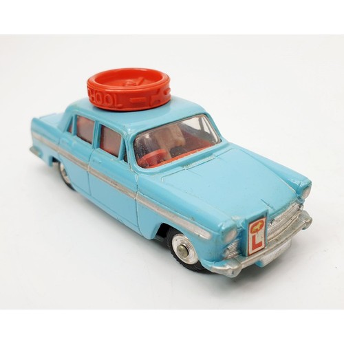 195 - A vintage boxed Corgi Motor School Car, 236. UK shipping £14. We combine shipping.