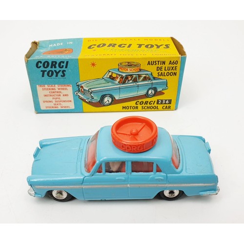 196 - A vintage boxed Corgi Motor School Car, 236. UK shipping £14. We combine shipping.