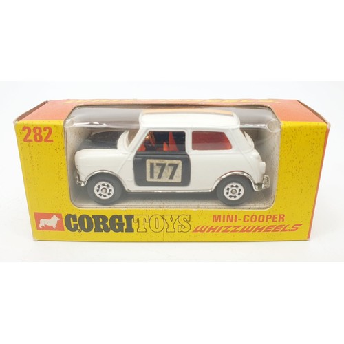 251 - A vintage boxed Corgi Whizzwheels Mini-Cooper, 282. UK shipping. £14. We combine shipping.