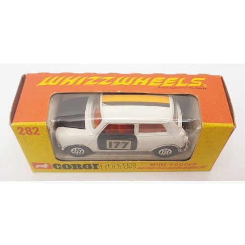 251 - A vintage boxed Corgi Whizzwheels Mini-Cooper, 282. UK shipping. £14. We combine shipping.