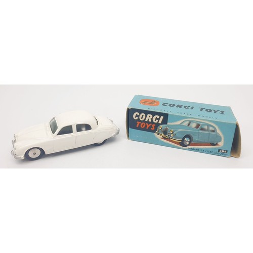 285 - A vintage boxed Corgi Jaguar 2.4ltr Saloon, 208. UK shipping £14. We combine shipping.