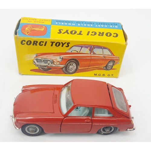 297 - A vintage boxed Corgi M.G.B. G.T., 327. UK shipping £14. We combine shipping.