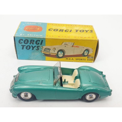 298 - A vintage boxed Corgi M.G.A. Sports Car, 302. UK shipping £14. We combine shipping.