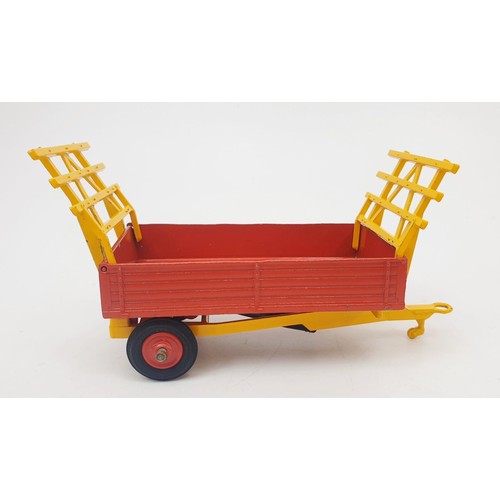 302 - A vintage boxed Corgi Farm Tipper Trailer, 62. UK shipping £14. We combine shipping.