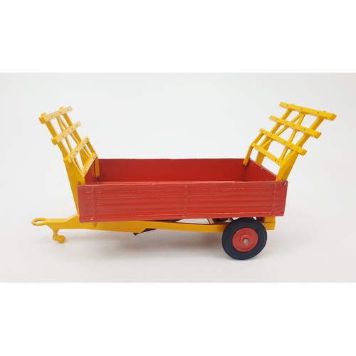 302 - A vintage boxed Corgi Farm Tipper Trailer, 62. UK shipping £14. We combine shipping.