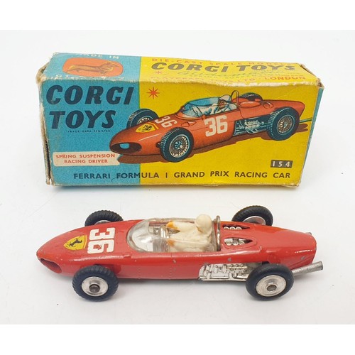 343 - A vintage boxed Corgi Ferrari Formula 1 Grand Prix Racing Car, 154. UK shipping £14. We combine ship... 