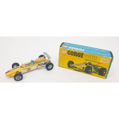 348 - A vintage boxed Corgi Cooper Maserati F/1 Driver Controlled Steering, 159. UK shipping £14. We combi... 