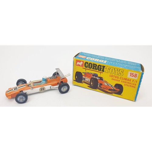 349 - A vintage boxed Corgi A Lotus-Climax F/1 Driver Controlled Steering, 158. UK shipping £14. We combin... 