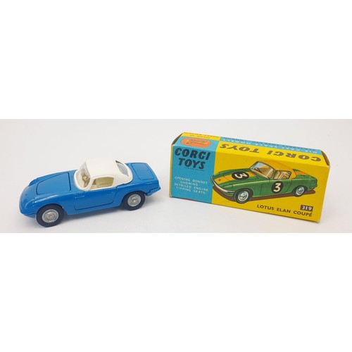 392 - A vintage boxed Corgi Lotus Elan Coupe, 319. UK shipping £14. We combine shipping.