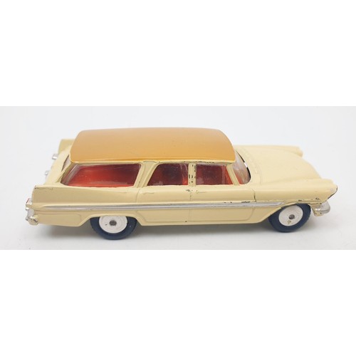 401 - A vintage boxed Corgi Plymouth Sports Suburban Station Wagon, 219. UK shipping £14. We combine shipp... 