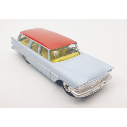 406 - A vintage boxed Corgi Plymouth Sports Suburban Station Wagon, 445. UK shipping £14. We combine shipp... 