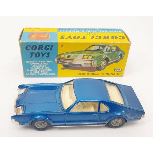 414 - A vintage boxed Corgi Oldsmobile Tornado, 264. UK shipping £14. We combine shipping.