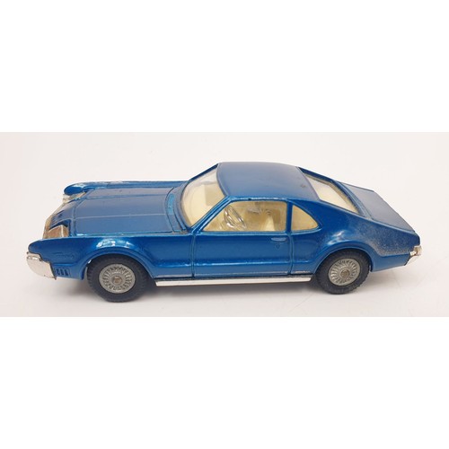 414 - A vintage boxed Corgi Oldsmobile Tornado, 264. UK shipping £14. We combine shipping.