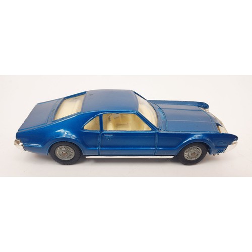 414 - A vintage boxed Corgi Oldsmobile Tornado, 264. UK shipping £14. We combine shipping.