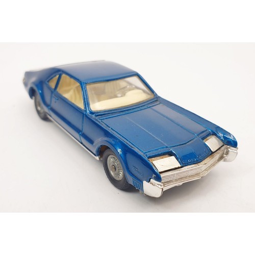 414 - A vintage boxed Corgi Oldsmobile Tornado, 264. UK shipping £14. We combine shipping.