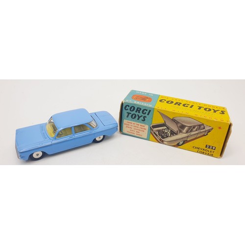 421 - A vintage boxed Corgi Chevrolet Corvair, 229. UK shipping £14. We combine shipping.