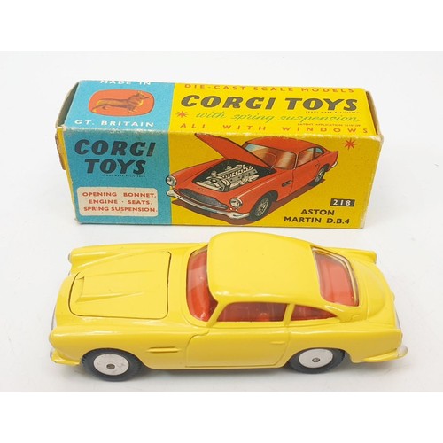 459 - A vintage boxed Corgi Aston Martin DB4, 218. UK shipping £14. We combine shipping.