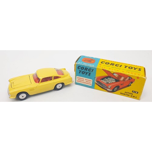 459 - A vintage boxed Corgi Aston Martin DB4, 218. UK shipping £14. We combine shipping.