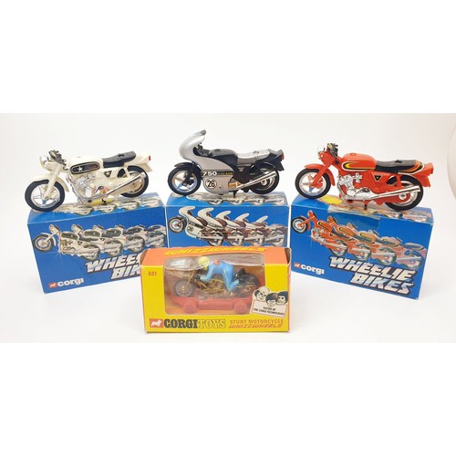 465 - Three vintage boxed Corgi Wheelie Bikes: Cafe Racer, Police Bike and Street Bike together with a vin... 