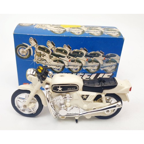 465 - Three vintage boxed Corgi Wheelie Bikes: Cafe Racer, Police Bike and Street Bike together with a vin... 