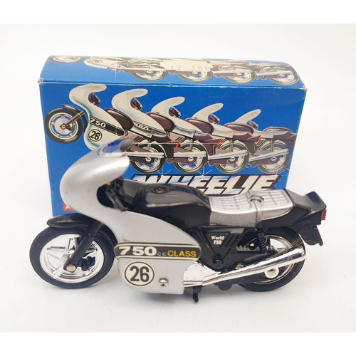 465 - Three vintage boxed Corgi Wheelie Bikes: Cafe Racer, Police Bike and Street Bike together with a vin... 