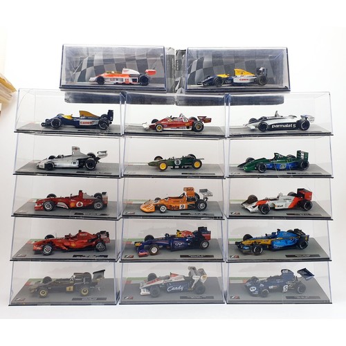 487 - Seventeen model F1 cars. UK shipping £14. We combine shipping.