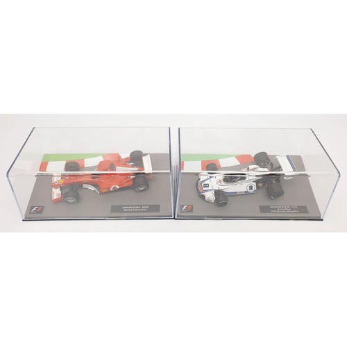 487 - Seventeen model F1 cars. UK shipping £14. We combine shipping.