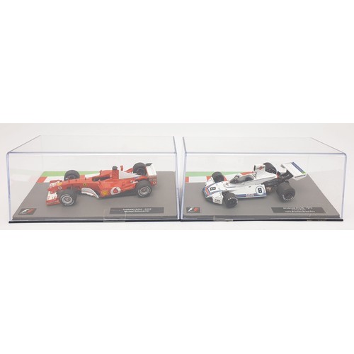 487 - Seventeen model F1 cars. UK shipping £14. We combine shipping.