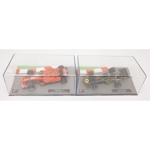 487 - Seventeen model F1 cars. UK shipping £14. We combine shipping.