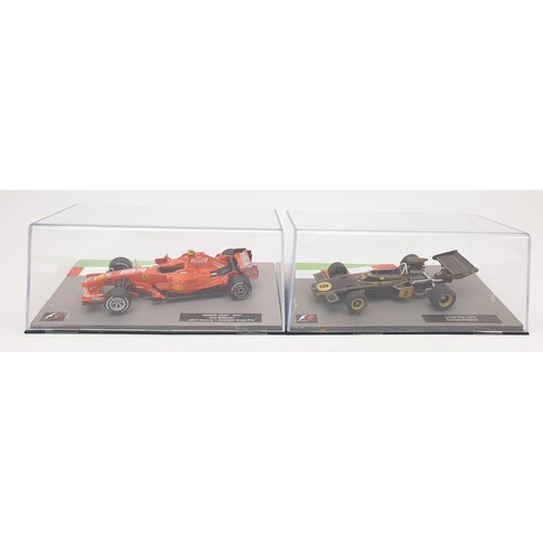 487 - Seventeen model F1 cars. UK shipping £14. We combine shipping.