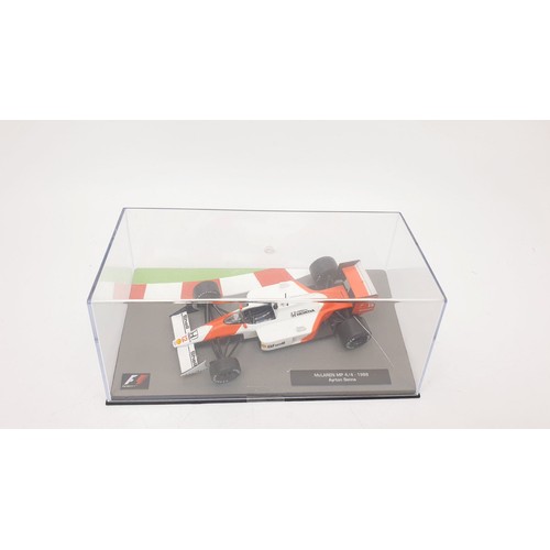 487 - Seventeen model F1 cars. UK shipping £14. We combine shipping.