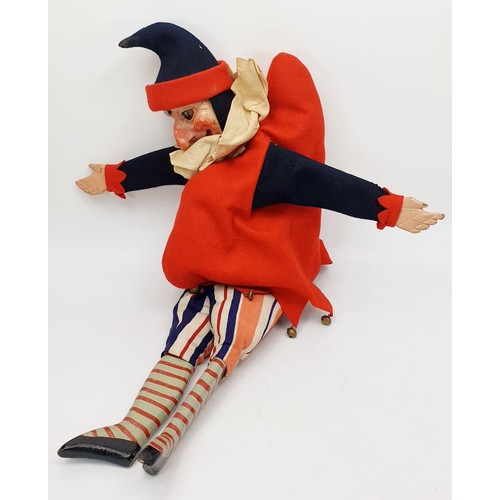 504 - Three antique wooden Punch and Judy puppets with plaster faces, with later fabric, the longest 22