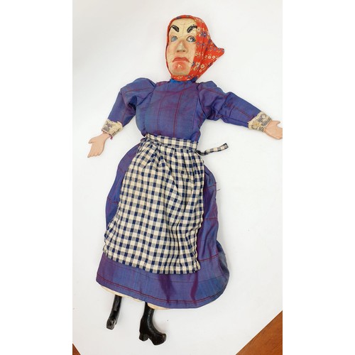 504 - Three antique wooden Punch and Judy puppets with plaster faces, with later fabric, the longest 22