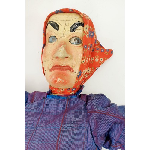 504 - Three antique wooden Punch and Judy puppets with plaster faces, with later fabric, the longest 22