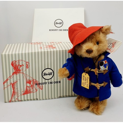 524 - A boxed Steiff articulated Paddington Bear, length 12