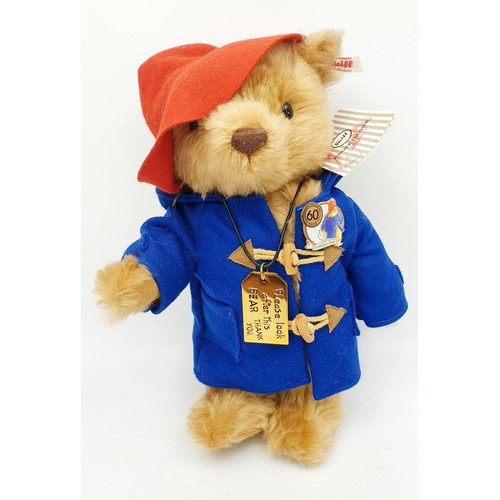 524 - A boxed Steiff articulated Paddington Bear, length 12