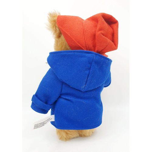 524 - A boxed Steiff articulated Paddington Bear, length 12