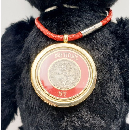 527 - A boxed Steiff Titanic Coin articulated teddy bear, length 11