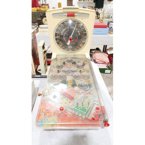 528 - A vintage Marx electric pin ball machine, length 27