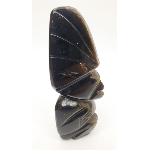 60 - A hard stone carving having a golden sheen, height 5