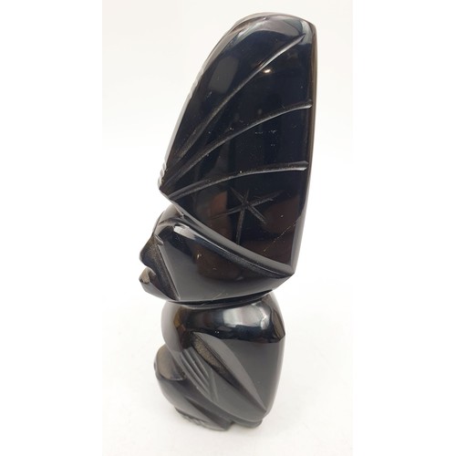 60 - A hard stone carving having a golden sheen, height 5