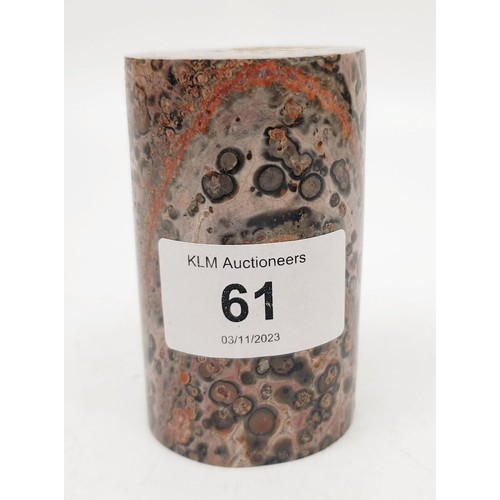 61 - A cylinder of rock containing fossils, height 3