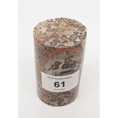 61 - A cylinder of rock containing fossils, height 3