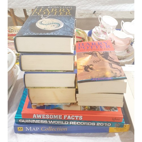 107 - A selection of Harry Potter books including four first editions together with other books. UK shippi... 