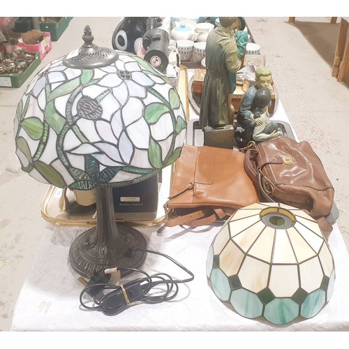 114 - A Tiffany style table lamp with metal base, height 18.5