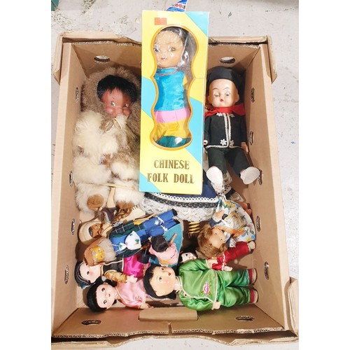242 - A box of vintage  international dolls including composite. UK shipping £14.