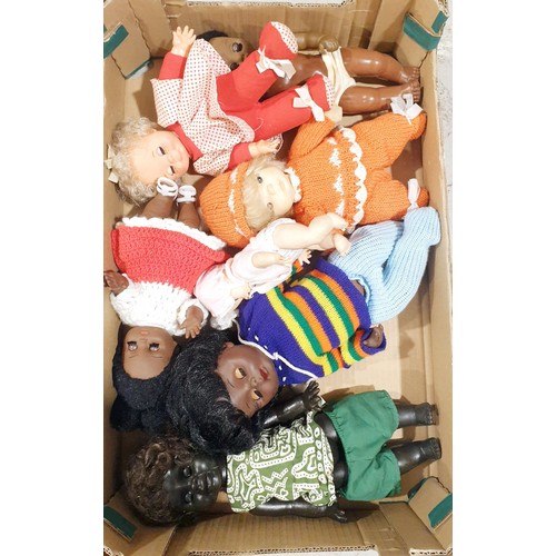 243 - A box of vintage dolls. UK shipping £14.